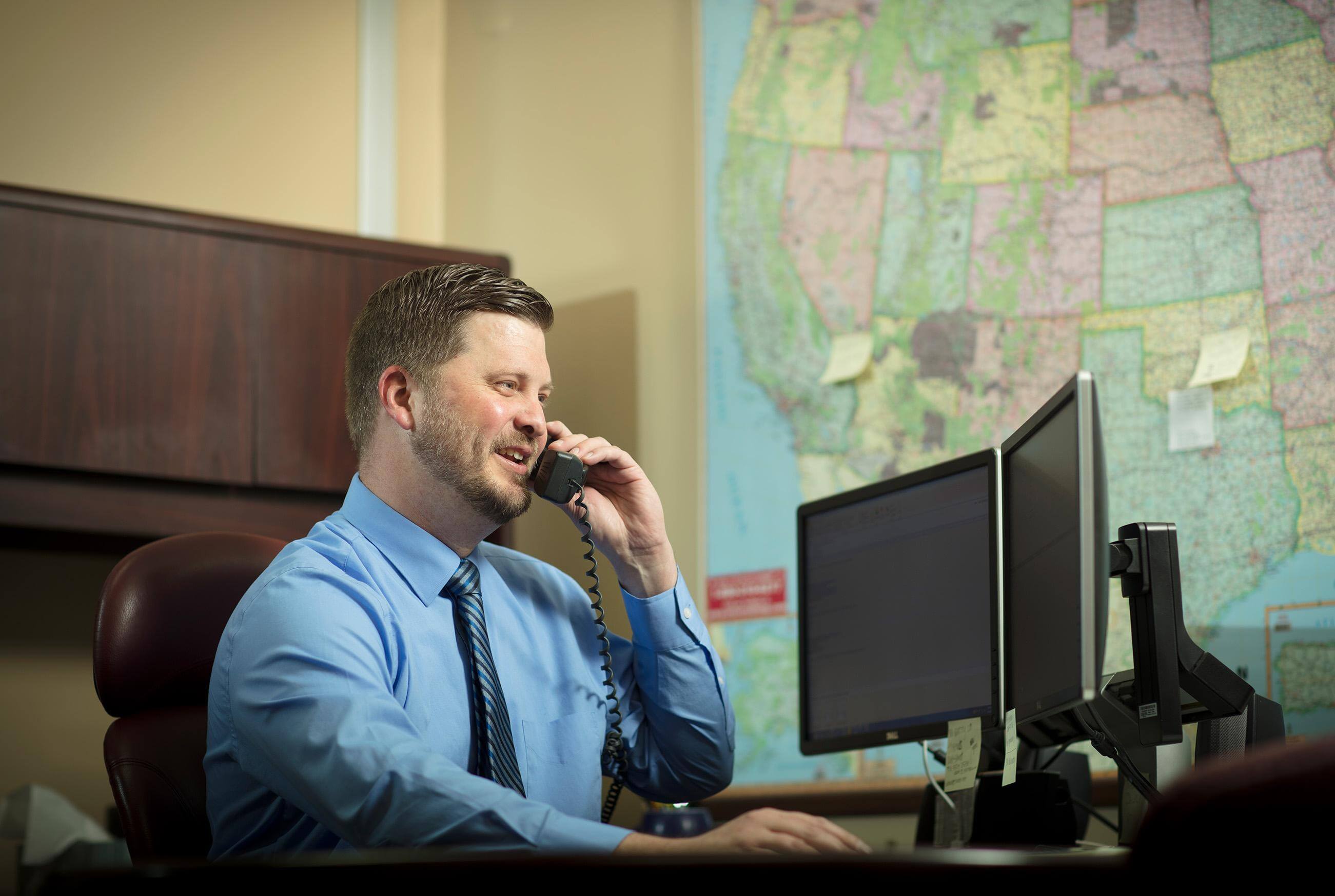 Robroy Associate taking a quote request at his desk